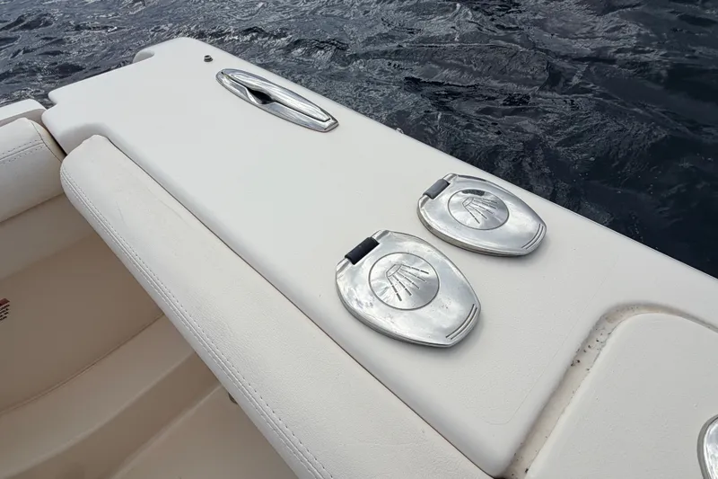 Slide: The Image of 2021 Grady-White Freedom 335 boat deck with stainless steel fittings on water. - 76