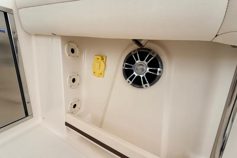 Slide: The Image of Interior view of 2021 Grady-White Freedom 335 boat, featuring speaker and outlets. - 36