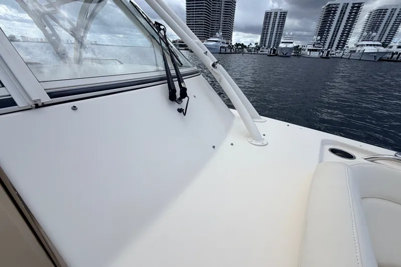 Slide: The Image of 2021 Grady-White Freedom 335 boat interior with marina view. - 12