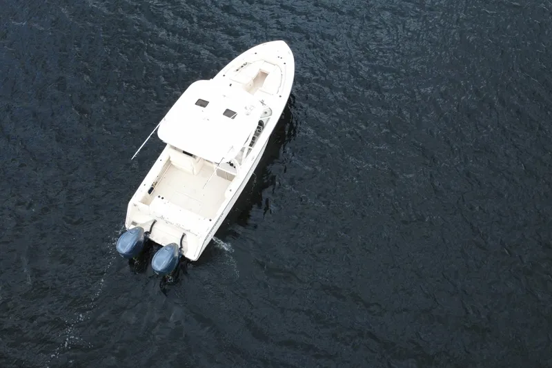 Slide: The Image of Aerial view of 2021 Grady-White Freedom 335 boat on open water. - 5