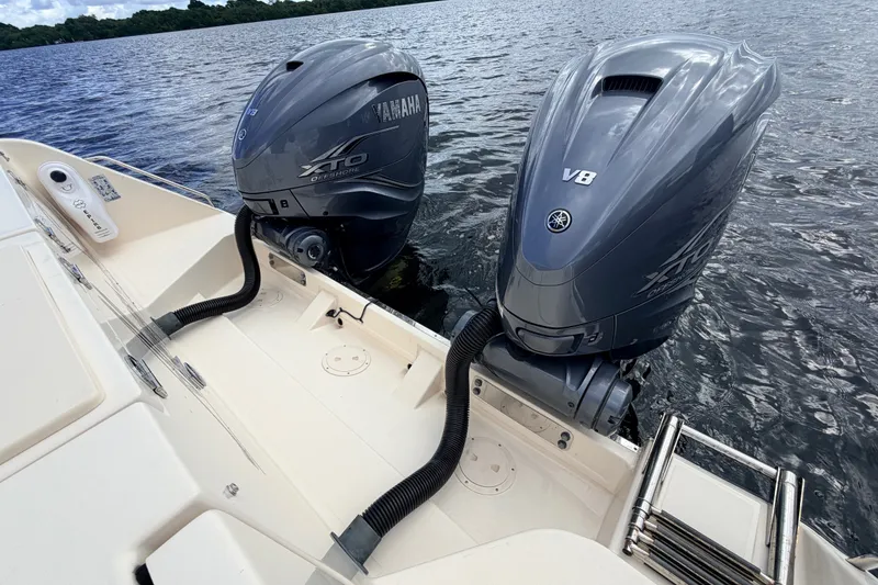 Slide: The Image of Grady-White Freedom 335 boat with twin Yamaha XTO V8 outboard engines on water. - 68