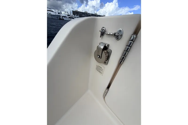 Slide: The Image of 2021 Grady-White Freedom 335 boat detail with chrome fittings and ocean backdrop. - 72