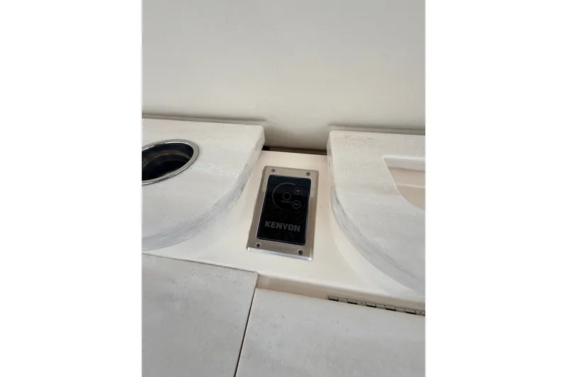 Slide: The Image of Kenyon control panel on 2021 Grady-White Freedom 335 boat countertop. - 35
