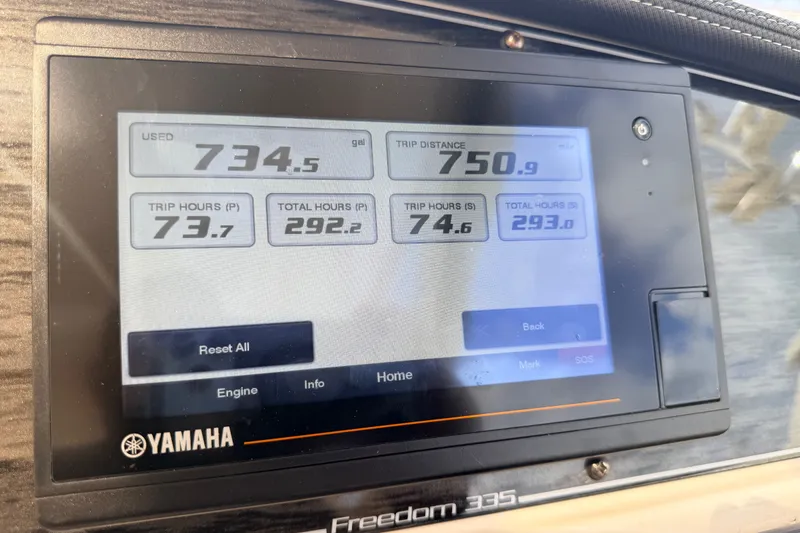 Slide: The Image of Yamaha display on 2021 Grady-White Freedom 335 showing fuel usage and trip data. - 81