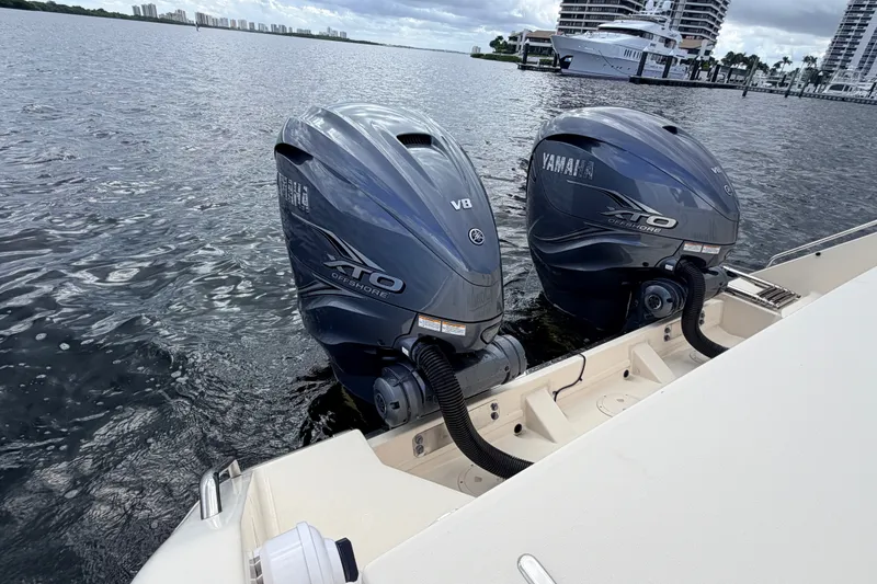 Slide: The Image of Twin Yamaha XTO V8 engines on a 2021 Grady-White Freedom 335 boat. - 70
