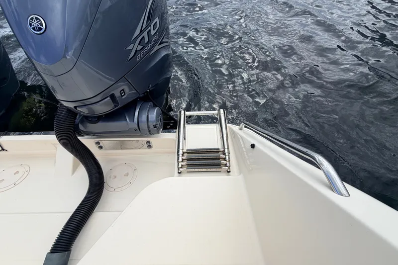 Slide: The Image of 2021 Grady-White Freedom 335 boat with Yamaha XTO Offshore engine and swim ladder. - 67