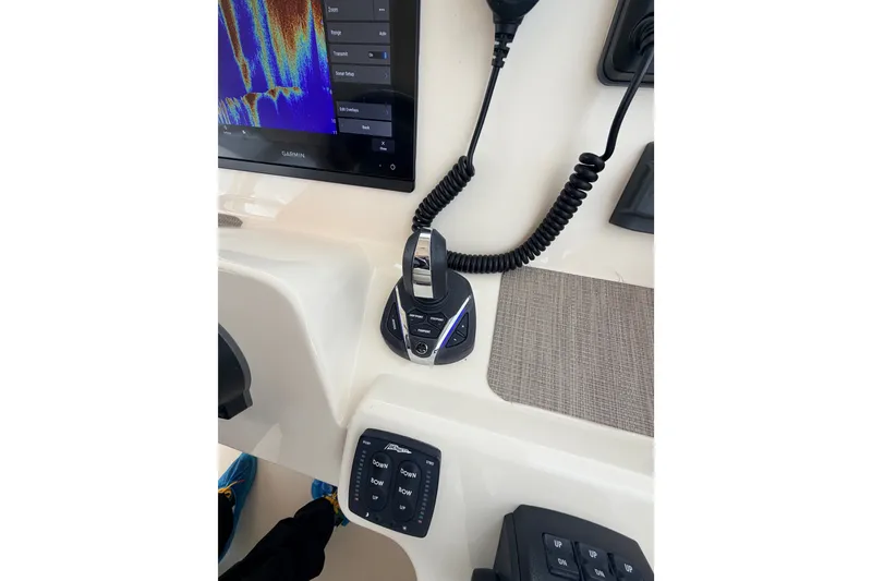 Slide: The Image of Control panel of 2021 Grady-White Freedom 335 boat with Garmin display and joystick. - 15