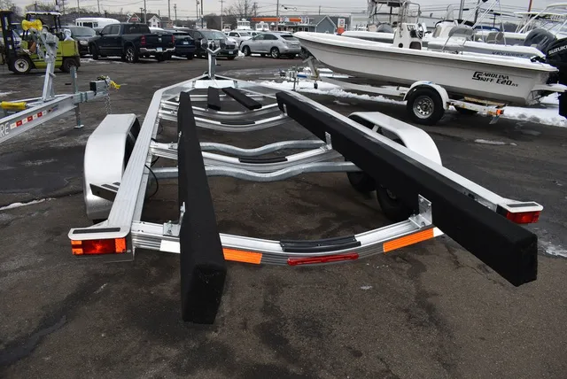 Slide: The Image of Yacht Club Trailers 29-10000 Aluminum tandem axle bunk boat trailer 2026 - 6