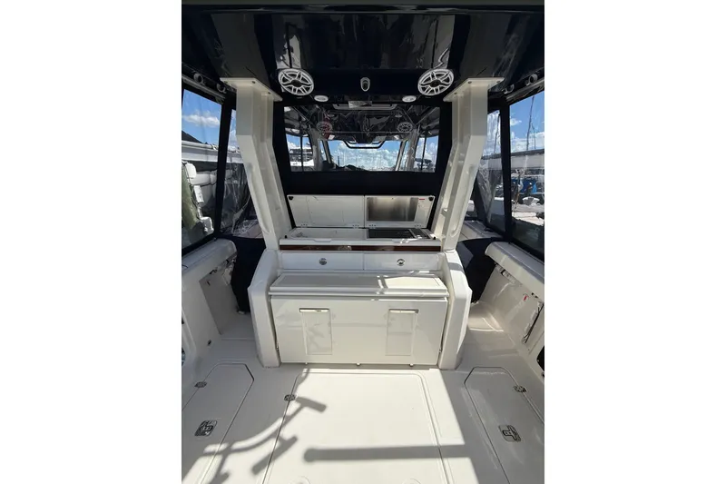 Slide: The Image of 2025 Pursuit S 328 Sport boat interior with sleek design and modern amenities. - 4
