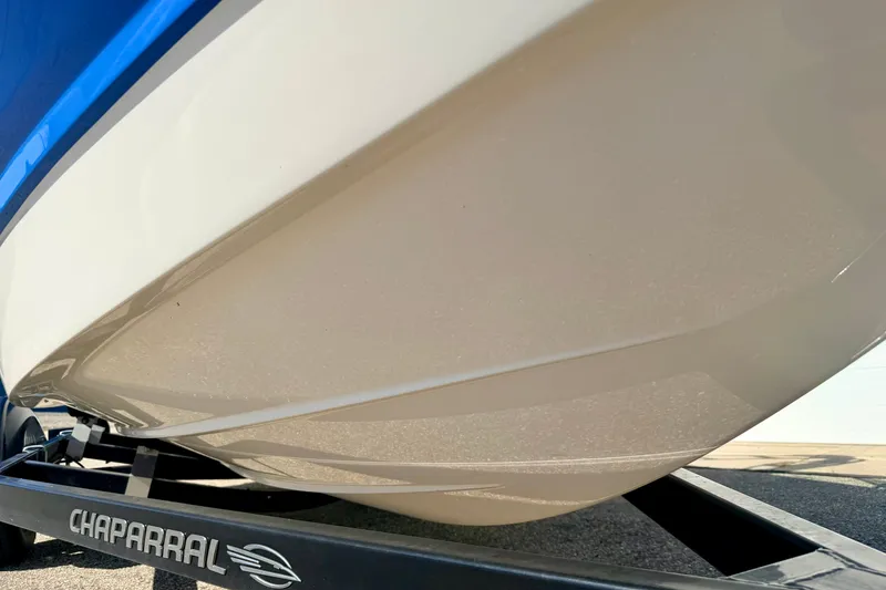 Slide: The Image of 2017 Chaparral 19 Sport H2O boat hull on trailer, close-up view. - 16