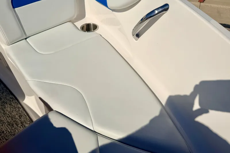 Slide: The Image of Interior seating of 2017 Chaparral 19 Sport H2O boat with cup holder and handle. - 62