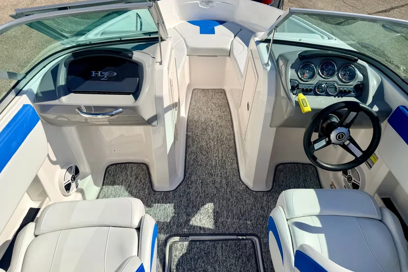 Slide: The Image of 2017 Chaparral 19 Sport H2O boat interior with steering wheel and dashboard. - 70