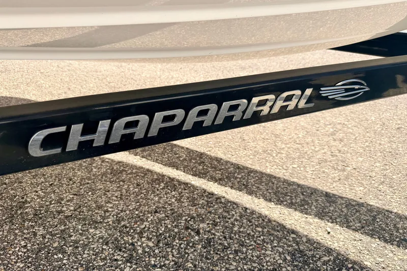 Slide: The Image of Chaparral 19 Sport H2O 2017 trailer detail on asphalt background. - 78