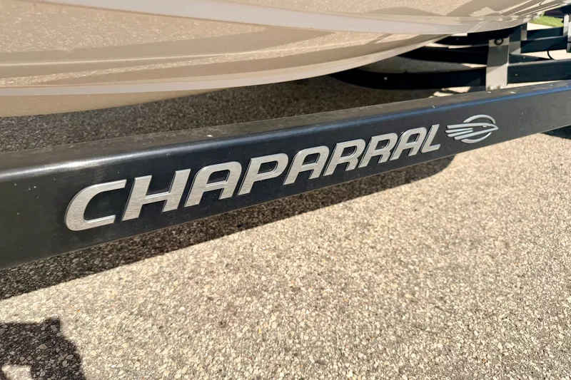 Slide: The Image of 2017 Chaparral 19 Sport H2O trailer detail on asphalt surface. - 75