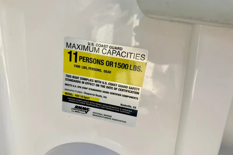 Slide: The Image of 2017 Chaparral 19 Sport H2O capacity label: 11 persons or 1500 lbs. - 48
