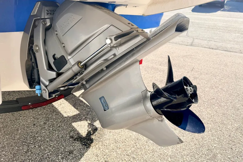 Slide: The Image of Close-up of a 2017 Chaparral 19 Sport H2O boat's Volvo Penta outdrive and propeller. - 21