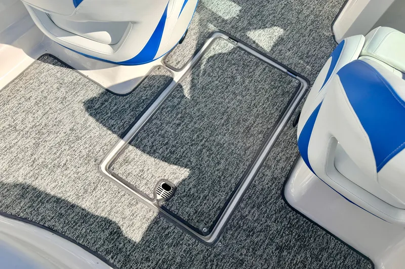 Slide: The Image of Interior of 2017 Chaparral 19 Sport H2O boat with blue and white seating. - 58
