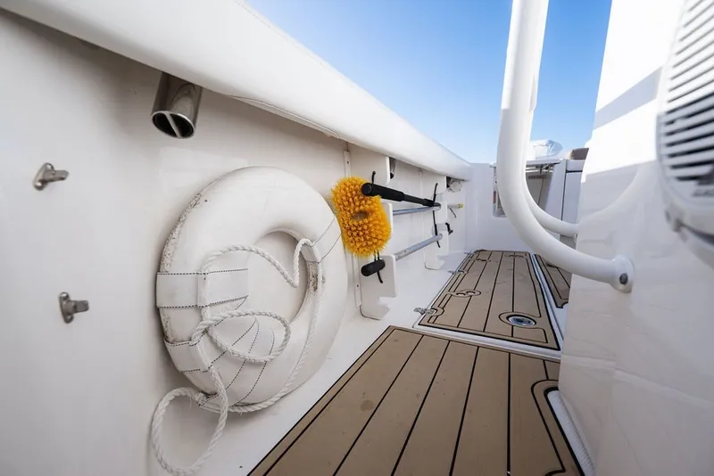 Slide: The Image of Interior view of 2020 Edgewater 370CC boat, featuring deck and safety equipment. - 43