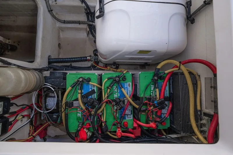 Slide: The Image of Electrical system of a 2020 Edgewater 370CC boat with batteries and wiring. - 69