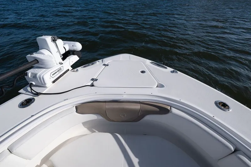 Slide: The Image of 2020 Edgewater 370CC boat bow with Minn Kota motor on open water. - 67