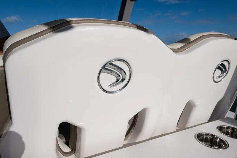 Slide: The Image of 2020 Edgewater 370CC boat seating with logo and cup holders. - 62
