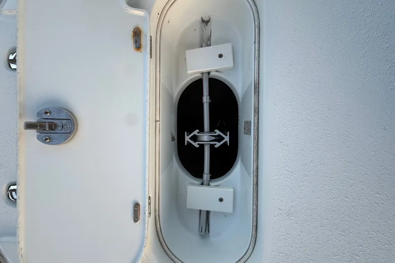 Slide: The Image of Hatch compartment of 2014 Yellowfin 32 Offshore boat, showing interior mechanism. - 16