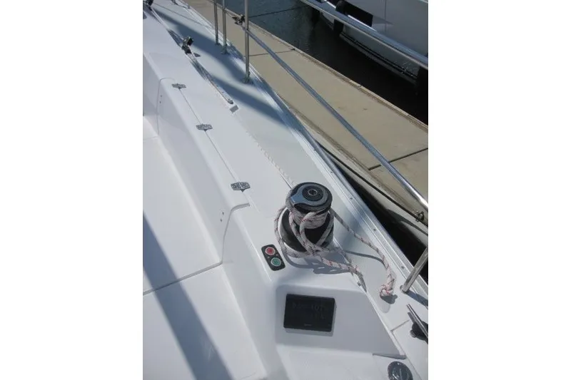Slide: The Image of Deck view of 2025 Catalina 386 sailboat with winch and rope details. - 42