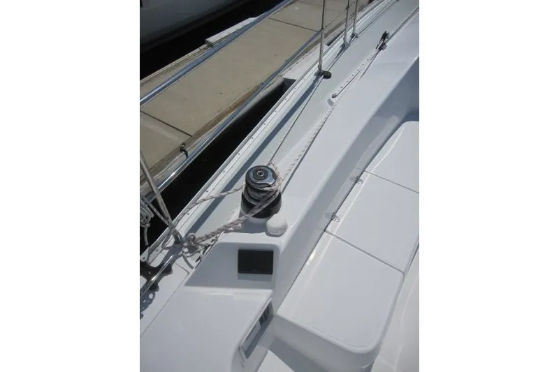 Slide: The Image of Sailboat deck of 2025 Catalina 386, featuring winch and rope details. - 41