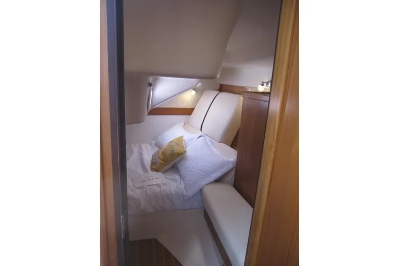 Slide: The Image of Cozy cabin interior of 2025 Catalina 386 yacht with plush bedding and wooden accents. - 33