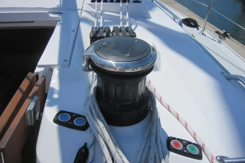 Slide: The Image of Deck of 2025 Catalina 386 sailboat with winch and control buttons. - 44