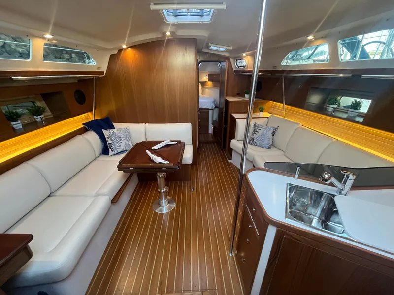 Slide: The Image of Luxurious interior of 2025 Catalina 386 yacht with elegant wood finishes and modern amenities. - 1