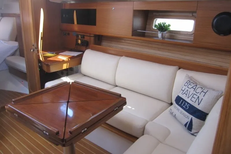 Slide: The Image of Luxurious interior of 2025 Catalina 386 yacht with elegant wood and white furnishings. - 32