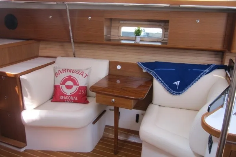 Slide: The Image of Interior of 2025 Catalina 386 yacht with cozy seating and wooden accents. - 27