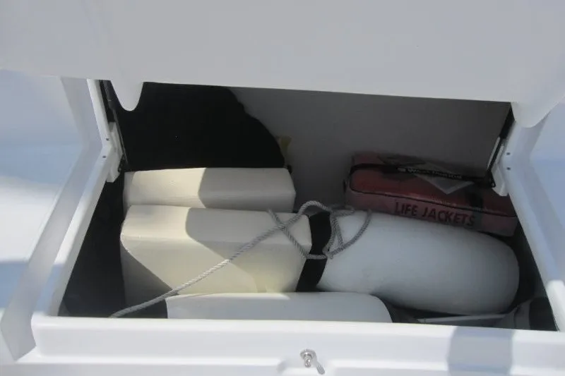 Slide: The Image of Open storage compartment on Catalina 386, 2025 model, with life jackets and fenders. - 51