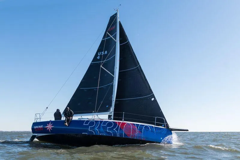 Slide: The Image of 2025 Jeanneau Sun Fast 3300 sailing on open water under clear skies. - 17