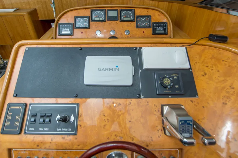 Slide: The Image of Control panel of a 2000 Johnson 58 yacht with Garmin navigation system. - 21