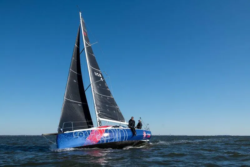 Slide: The Image of 2025 Jeanneau Sun Fast 3300 sailing on open water under clear blue sky. - 18