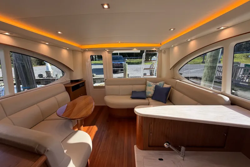 Slide: The Image of Luxurious interior of 2017 Tiara Yachts 39 Convertible with elegant seating and ambient lighting. - 51