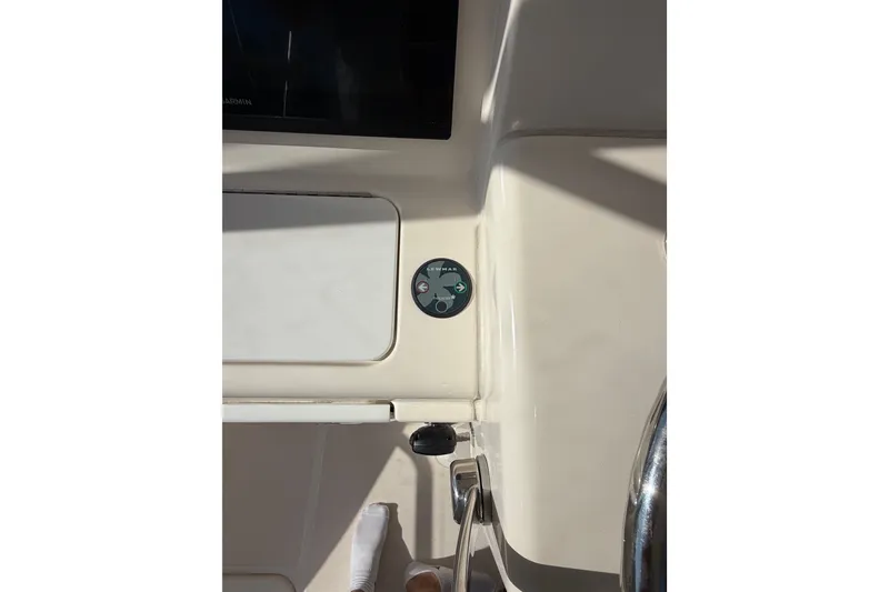 Slide: The Image of Control panel on 2017 Tiara Yachts 39 Convertible boat dashboard. - 42