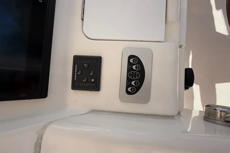 Slide: The Image of Control panel on a 2017 Tiara Yachts 39 Convertible boat dashboard. - 43