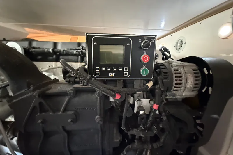 Slide: The Image of Engine compartment of 2017 Tiara Yachts 39 Convertible with CAT control panel. - 23