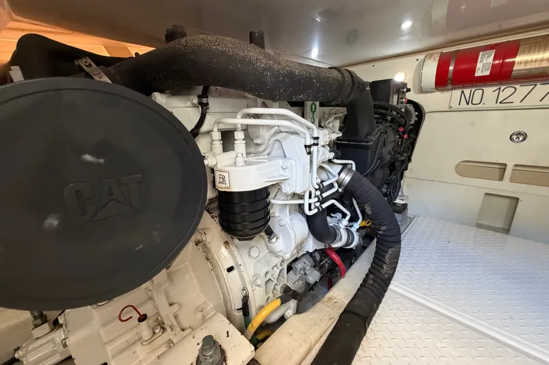 Slide: The Image of Engine room of 2017 Tiara Yachts 39 Convertible with CAT engine visible. - 25