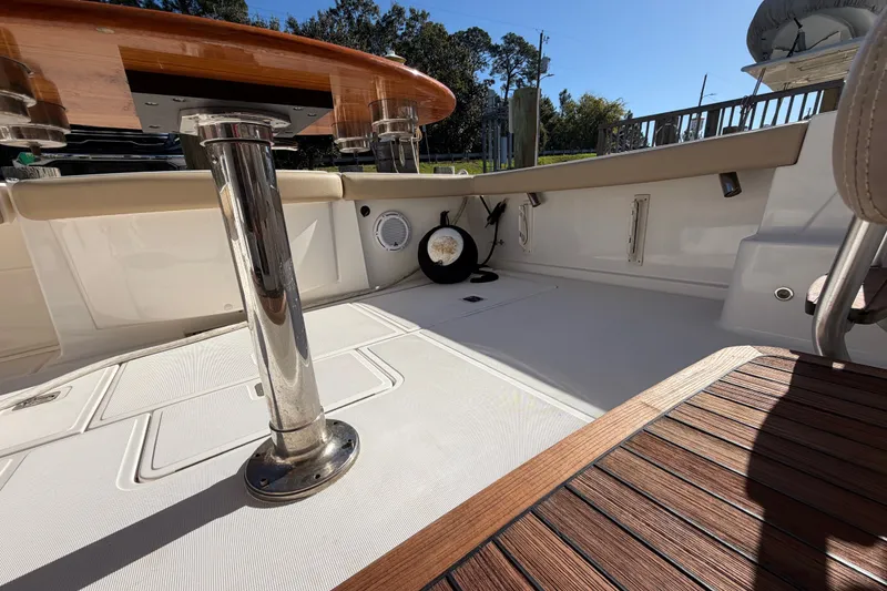Slide: The Image of 2017 Tiara Yachts 39 Convertible deck with polished metal and wood accents. - 22
