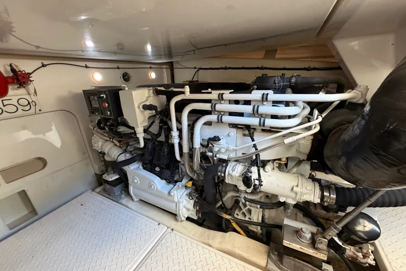 Slide: The Image of Engine room of a 2017 Tiara Yachts 39 Convertible, showcasing mechanical components. - 30