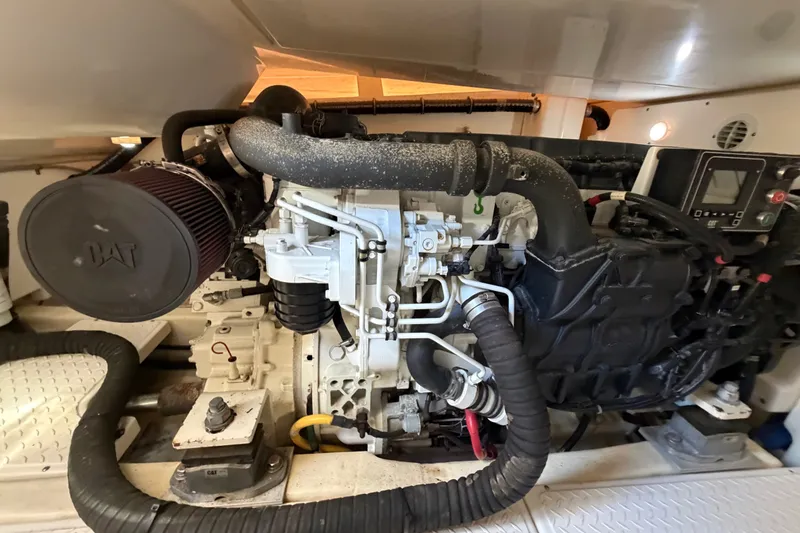 Slide: The Image of Engine room of 2017 Tiara Yachts 39 Convertible, featuring a CAT engine. - 32