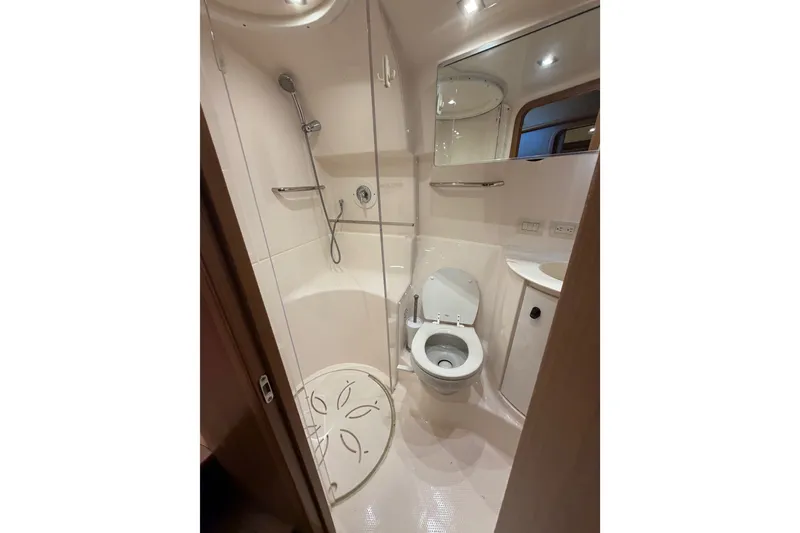 Slide: The Image of Bathroom interior of 2017 Tiara Yachts 39 Convertible with shower and toilet. - 53