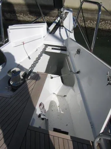 Slide: The Image of 2025 Jeanneau Yacht 65 anchor locker and deck details. - 25