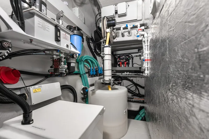 Slide: The Image of Engine room of 2023 Sunseeker Manhattan 55 yacht, showcasing advanced mechanical systems. - 62
