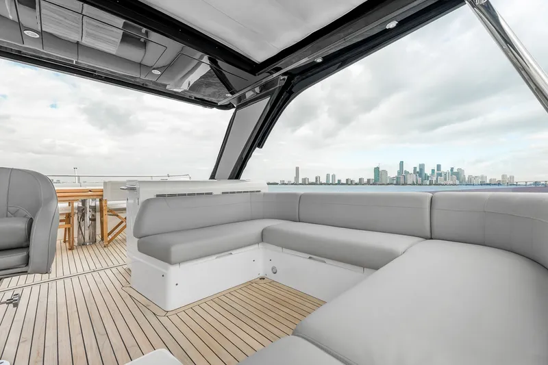 Slide: The Image of Luxurious 2023 Sunseeker Manhattan 55 yacht interior with city skyline view. - 41