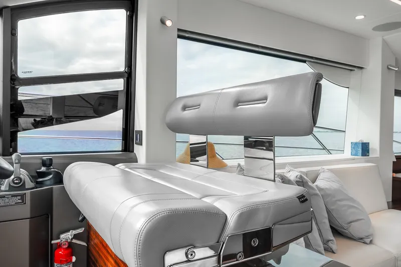 Slide: The Image of Luxurious interior of 2023 Sunseeker Manhattan 55 yacht with modern seating and ocean view. - 25